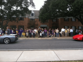 2011 Homecoming Parade Guests gather in front the Phi Psi House for the Homecoming Parade